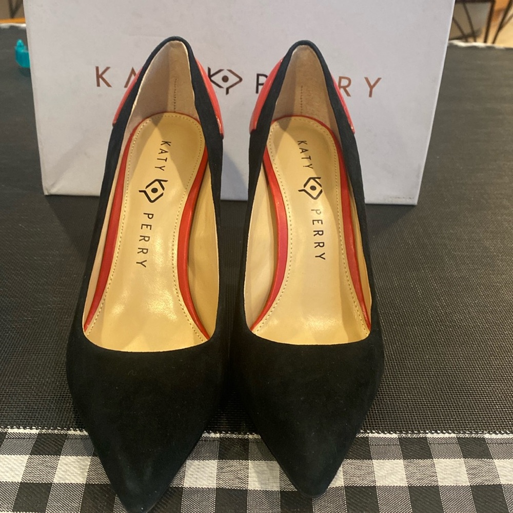 Katy Perry black suede shoes red lips trim on back. Brand new in box never worn.